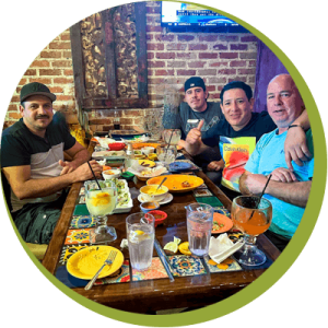 Team eating together at a Mexican restaurant photo